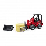 Incarcator compact Schaffer 2630 cu graifer si un balot rotund, Bruder