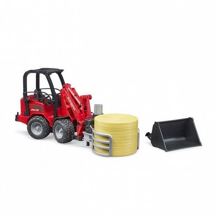 Incarcator compact Schaffer 2630 cu graifer si un balot rotund, Bruder